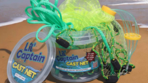 The Lil’ Captain Cast Net by Fitec, displayed on a beach